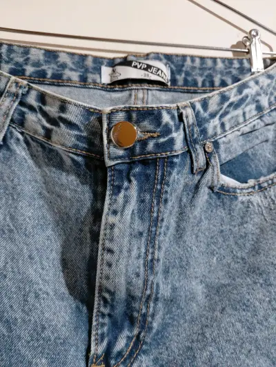 Jeans desgastados de mezclilla azul - miniatura 2