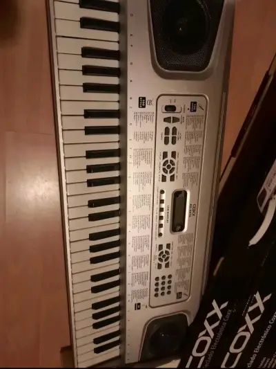 Teclado electrónico Coxx con 100 ritmos - miniatura 4
