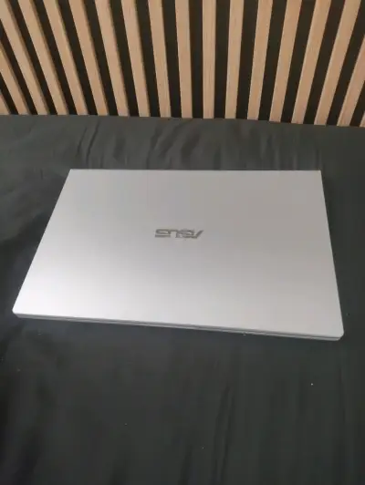 Laptop ASUS precio conversable - miniatura 1