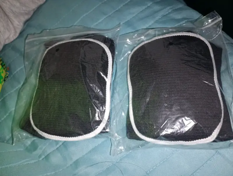 Rodilleras negras para protección deportiva