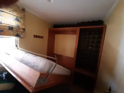 Cama abatible con estantería integrada - miniatura 1