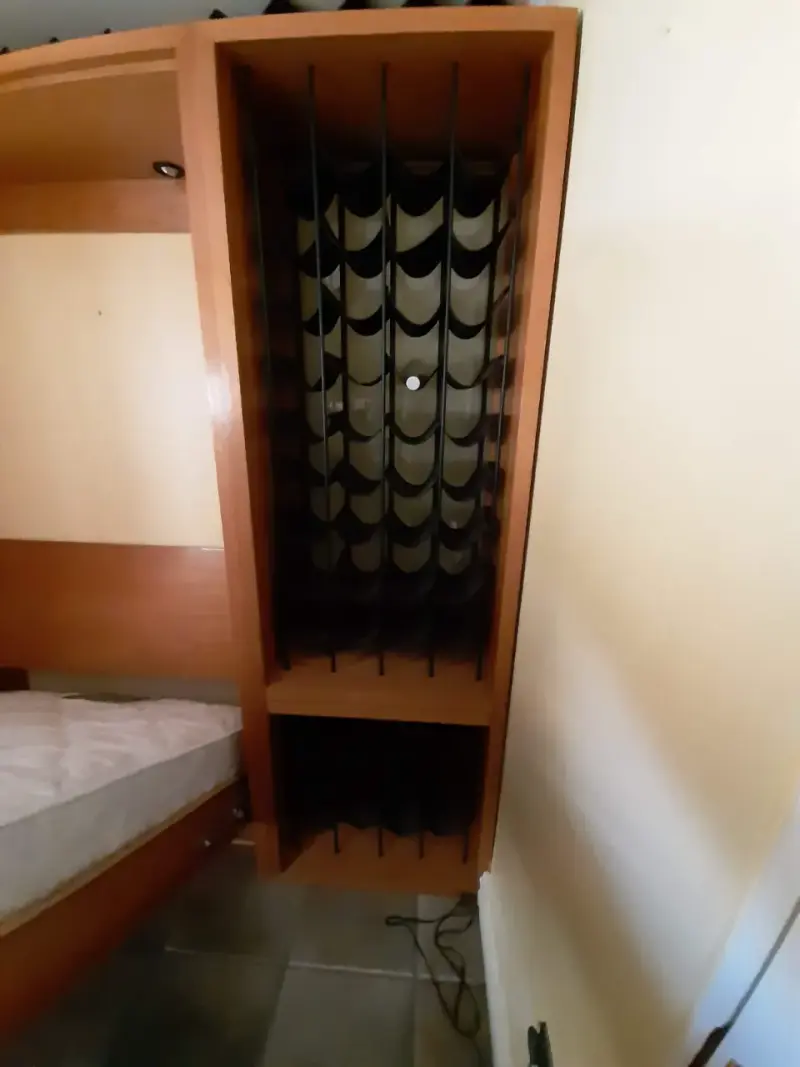 Cama abatible con estantería integrada - 4
