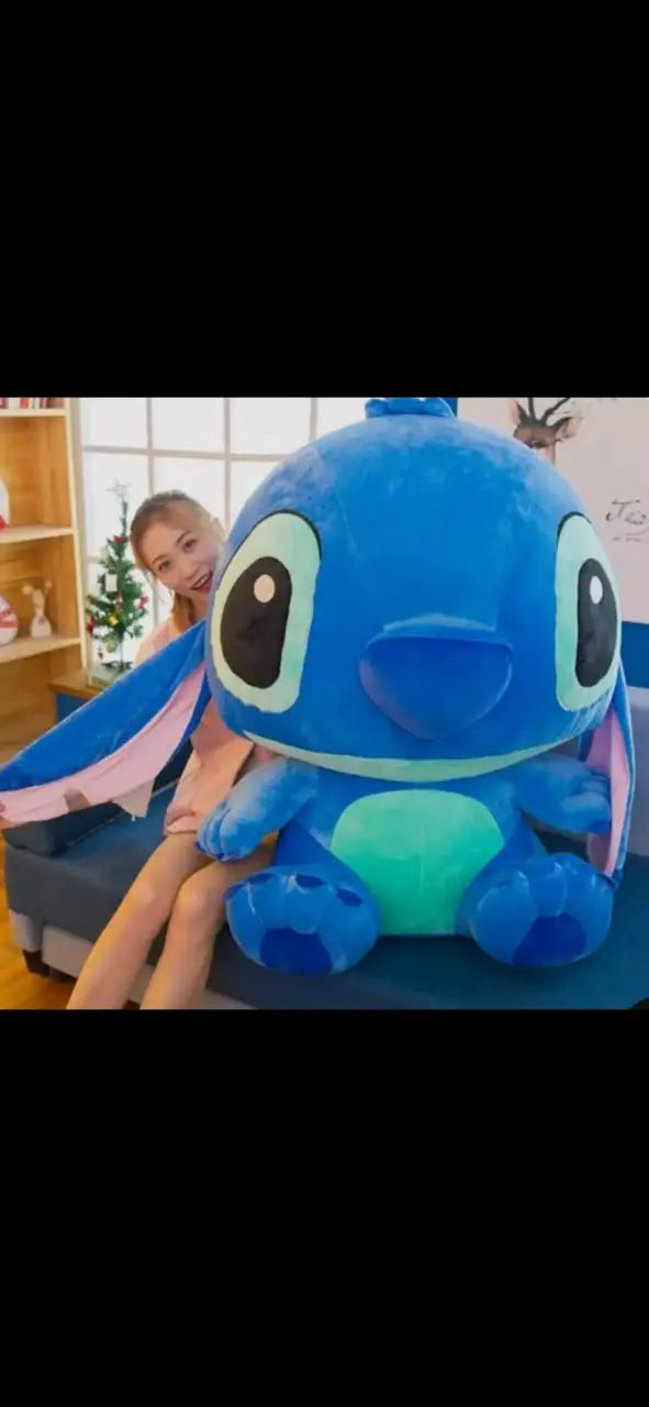 Peluche gigante azul de personaje animado