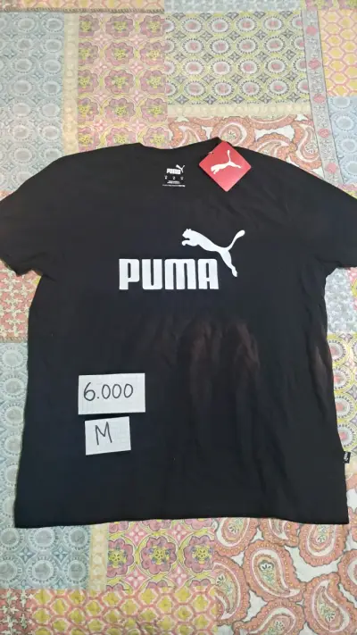 Polera negra Puma con logo - miniatura 1