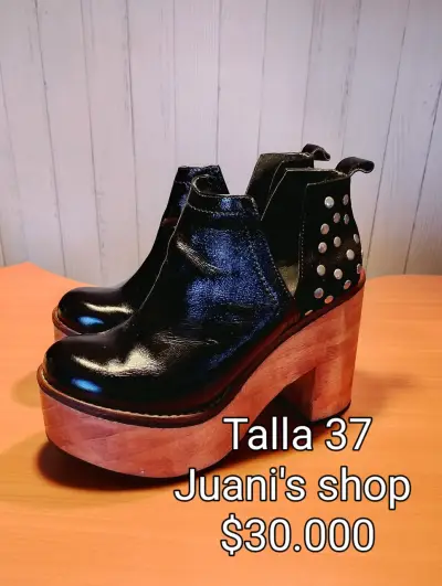Botines de cuero con plataforma y tachas - miniatura 1