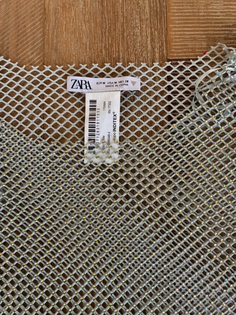 Top de malla con lentejuelas Zara