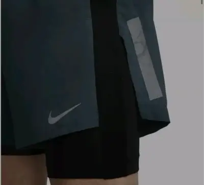 Short deportivo Nike verde con mallas - miniatura 1