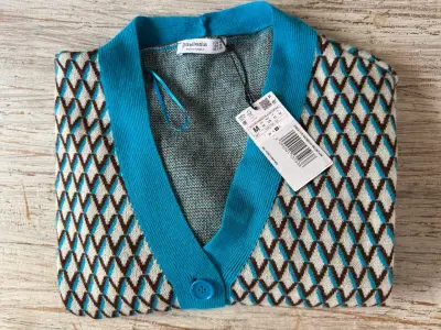 Cardigan de punto azul y marrón para mujer - miniatura 2