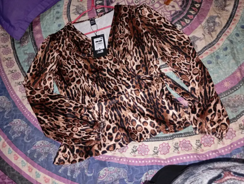 Blusa animal print con cinturón