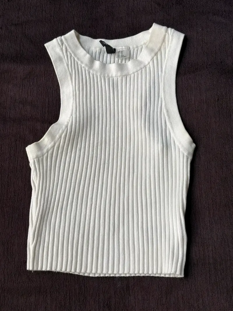 Top sin mangas blanco de canalé