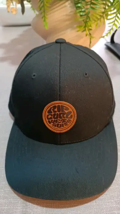 Gorra negra Rip Curl con logo - miniatura 1