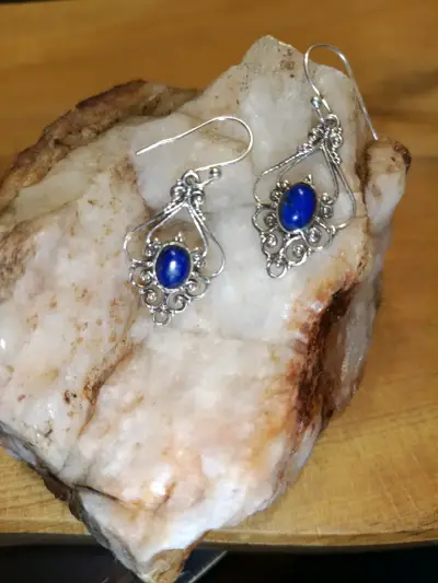 Aros de plata con piedra azul - miniatura 1
