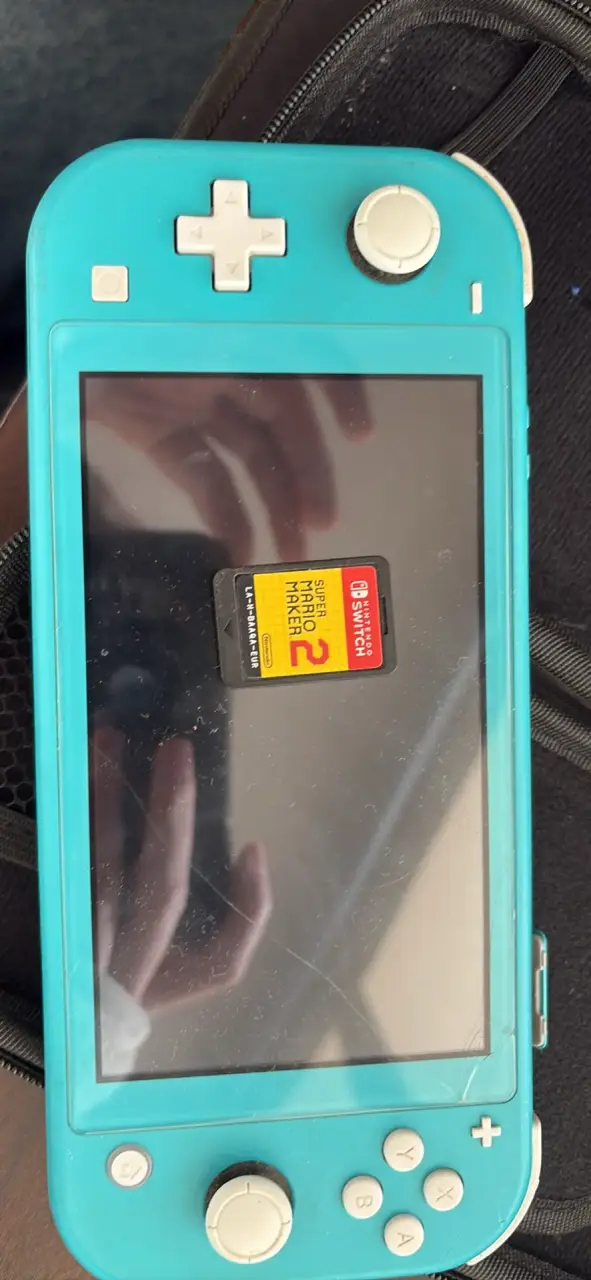 Nintendo switch lite, funda y juego - 2