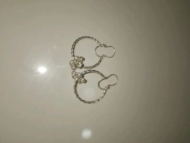 Aros de plata con diseño floral - 2