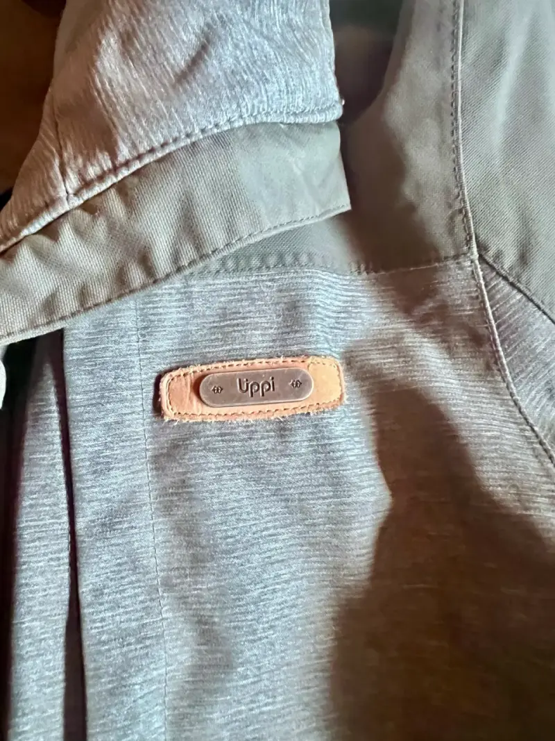 Parka impermeable verde con capucha - 2