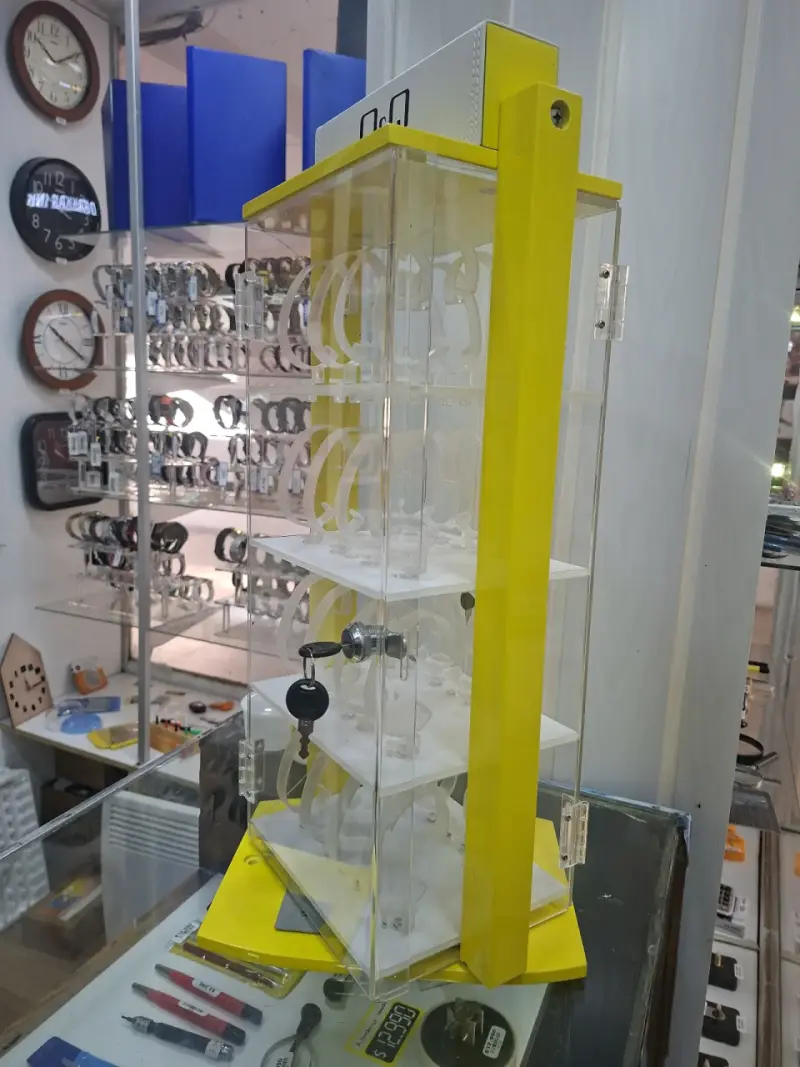 Vitrina giratoria para relojes con llave - 1