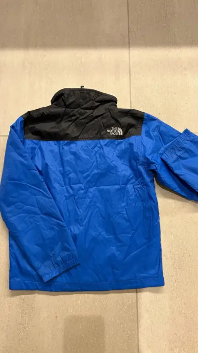 Chaqueta impermeable The North Face azul y negra - miniatura 2