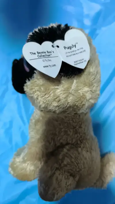 Peluche de perro pug con ojos grandes - miniatura 3