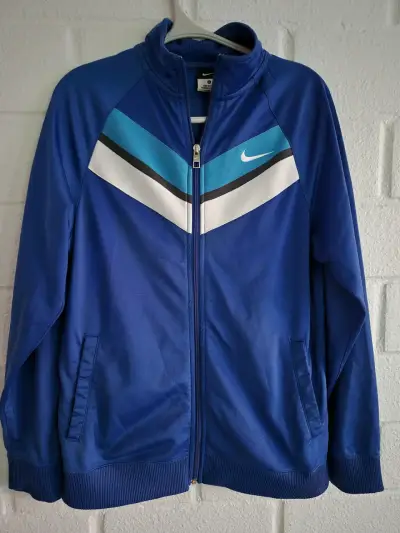 Chaqueta deportiva Nike azul con cierre - miniatura 1
