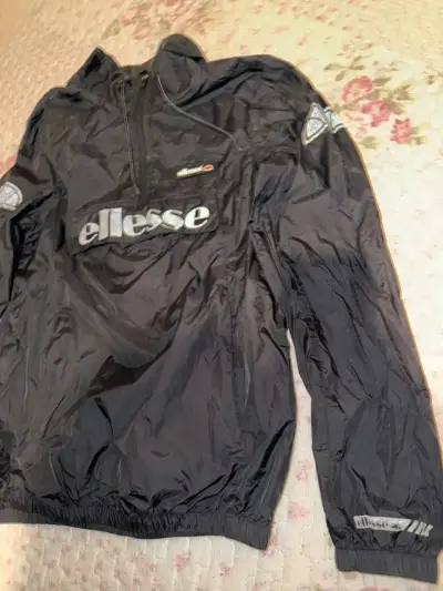 Cortavientos negro Ellesse con capucha - miniatura 2