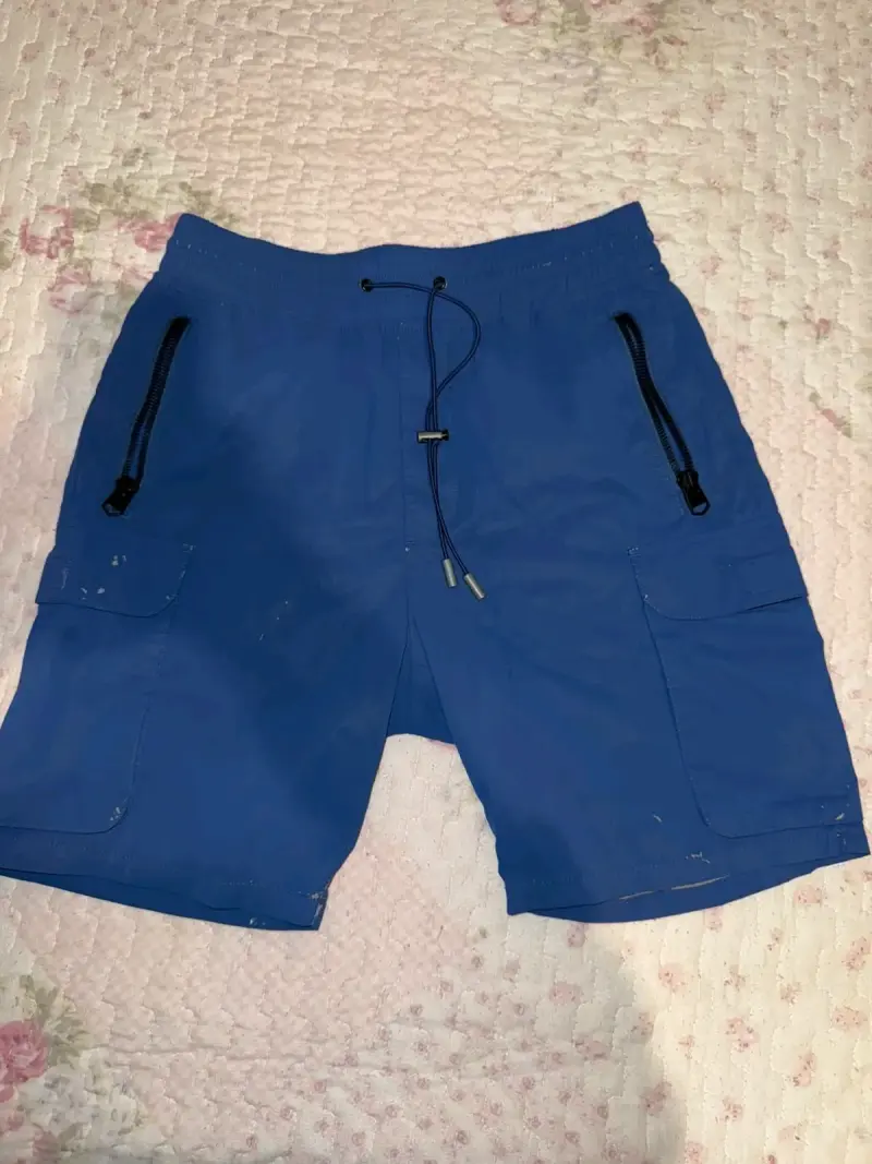 Shorts Zara deportivos azules con bolsillos - 1
