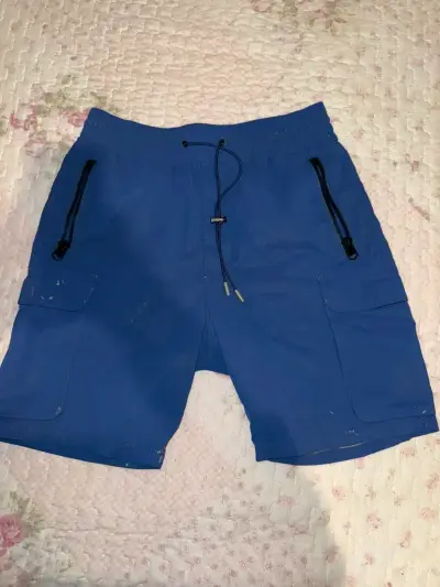 Shorts Zara deportivos azules con bolsillos - miniatura 1