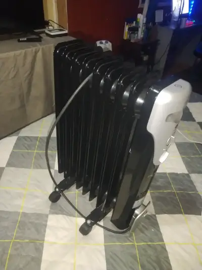 Calefactor eléctrico de aceite portátil - miniatura 1