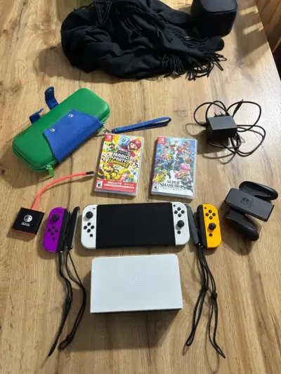 Nintendo Switch OLED con juegos y accesorios - miniatura 1