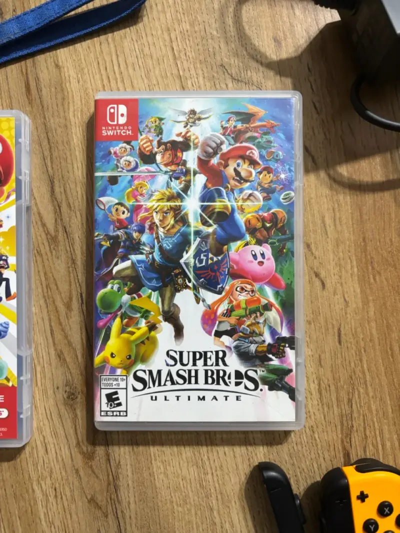 Nintendo Switch OLED con juegos y accesorios - 6