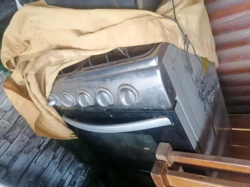 Cocina a gas con horno empotrable usada