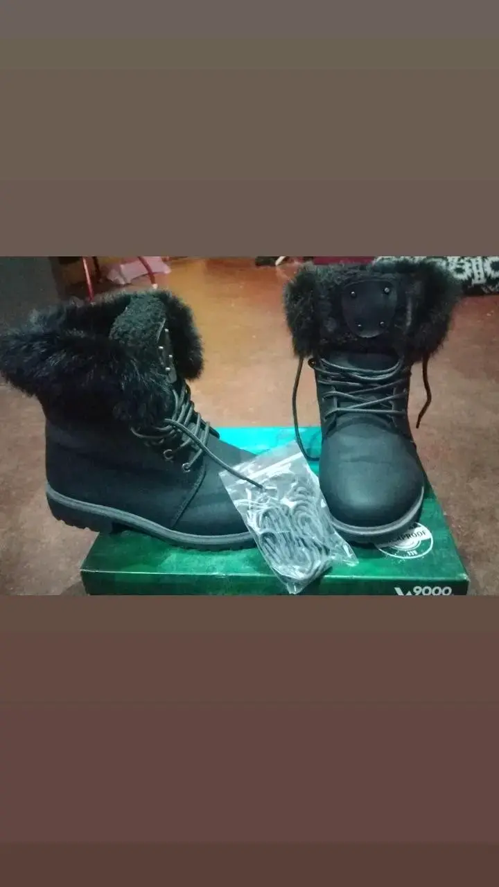 Botas negras con forro de piel sintética - 1