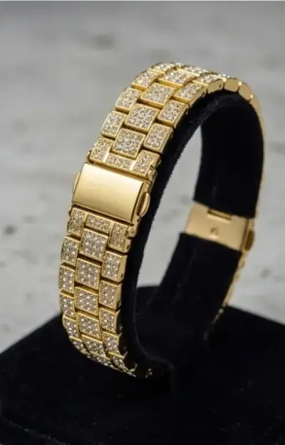Reloj de lujo dorado con brillantes - miniatura 3