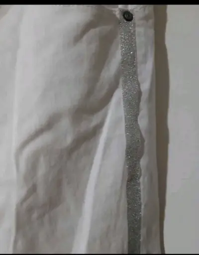 Pantalones blancos con detalle brillante - miniatura 1