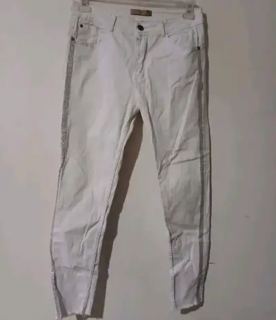 Pantalones blancos con detalle brillante - miniatura 2