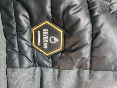 Chaqueta acolchada gris para invierno merrel - miniatura 2