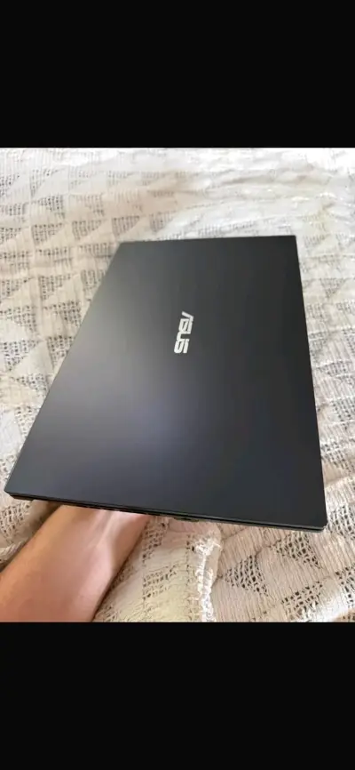 Laptop ASUS - miniatura 1