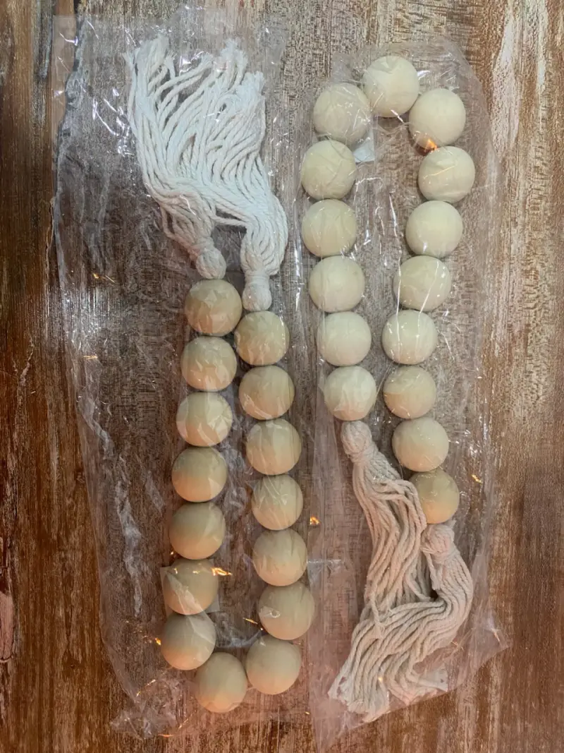 Guirnalda de bolas de madera decorativa