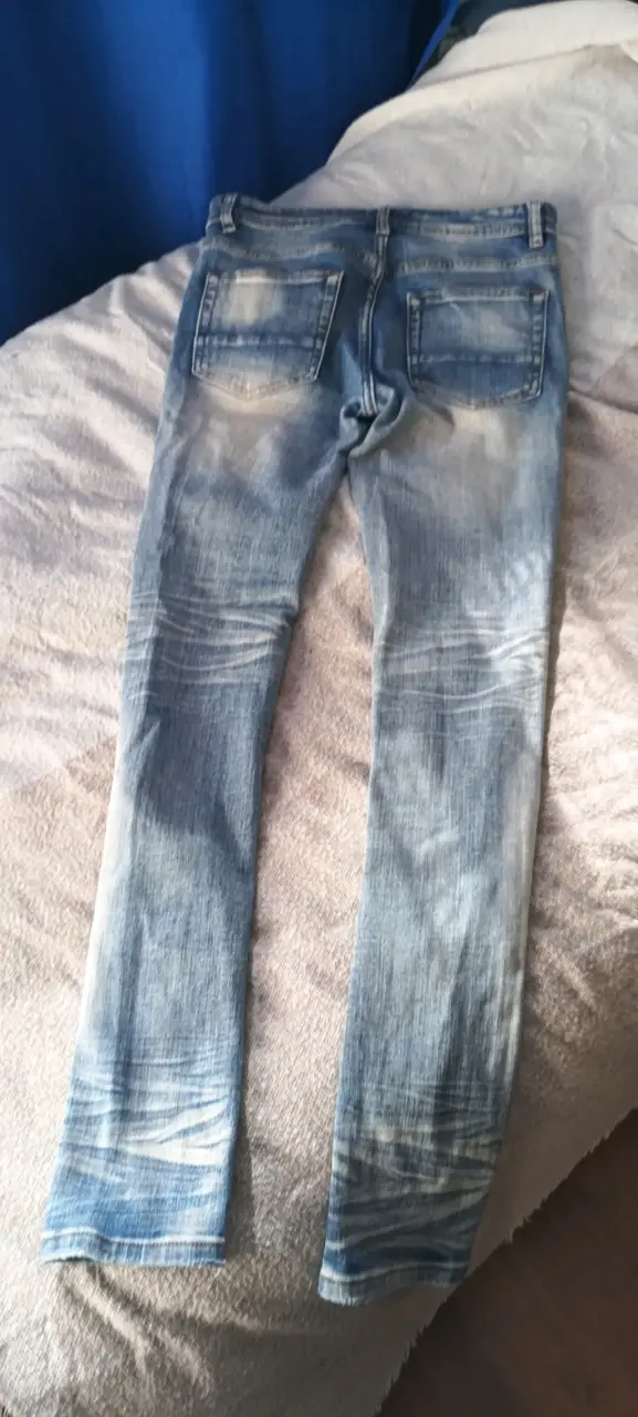 Jeans desgastados de mezclilla azul - 2