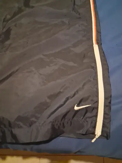 Pantalones deportivos Nike azul marino con franjas - miniatura 3