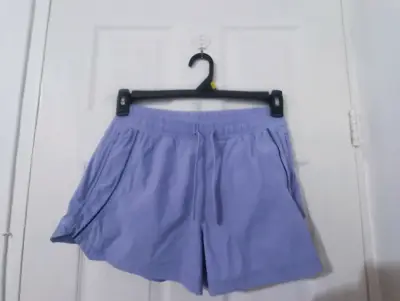 Shorts deportivos lilas para mujer - miniatura 1
