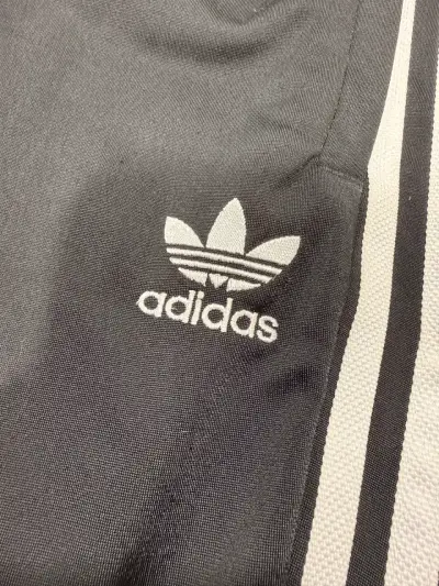Pantalones deportivos Adidas negros con franjas - miniatura 3