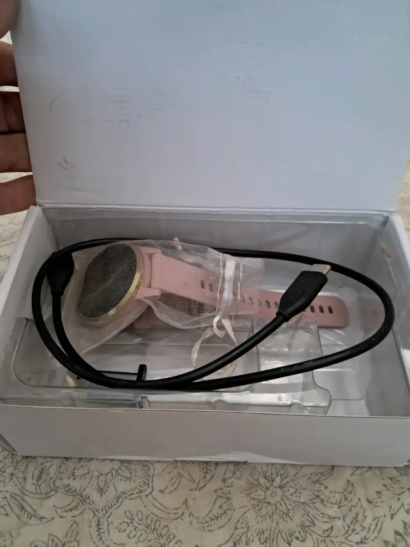 Smartwatch rosa con cargador incluido