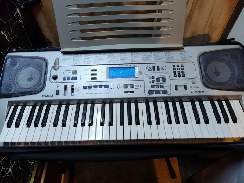 Teclado Casio CTK-591 con soporte