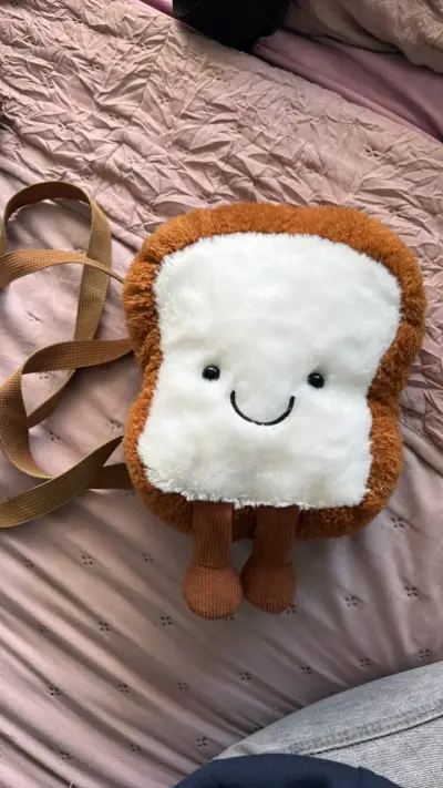 Mochila peluche de pancito - miniatura 1