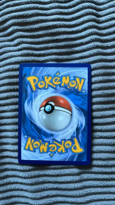 Carta Pokémon Moltres EX Team Rocket - miniatura 2