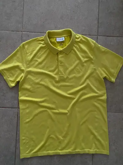 Polera polo Lacoste amarilla para hombre - miniatura 1