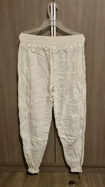 Pantalones blancos de lino elasticados - miniatura 2