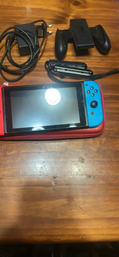 Consola Nintendo Switch con accesorios - miniatura 1