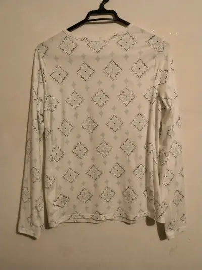 Polera manga larga con diseño geométrico - miniatura 1