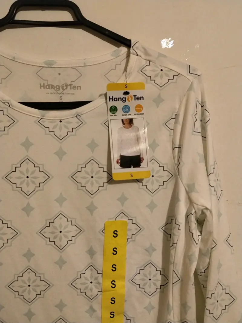 Polera manga larga con diseño geométrico - 2